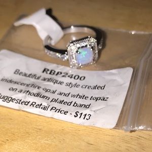 Size 7 rhodium plated band & iridescent fire opal